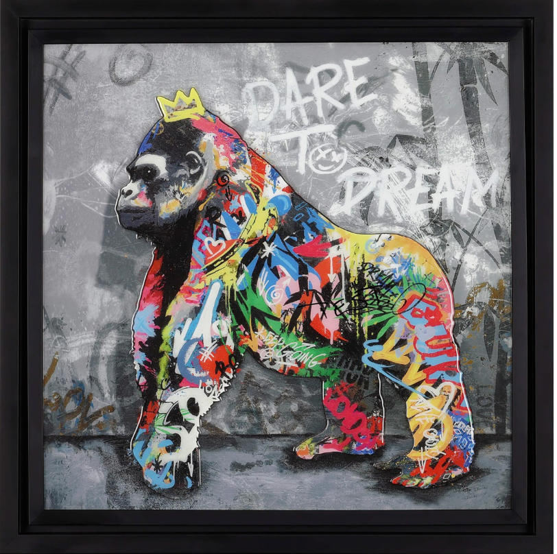 Colorful art print titled "Dare to Dream" by Yuvi, featuring inspiring text and vibrant abstract design.